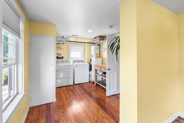134 Hampton Cir, Hull, MA 02045 - laundry area featuring separate washer and dryer and dark wood finished floors