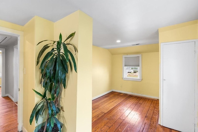 134 Hampton Cir, Hull, MA 02045 - unfurnished room with hardwood / wood-style flooring, baseboards, attic access, and recessed lighting