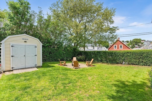 134 Hampton Cir, Hull, MA 02045 - view of grassy yard featuring a fire pit