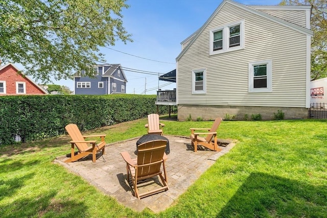 134 Hampton Cir, Hull, MA 02045 - view of yard featuring a fire pit and a patio