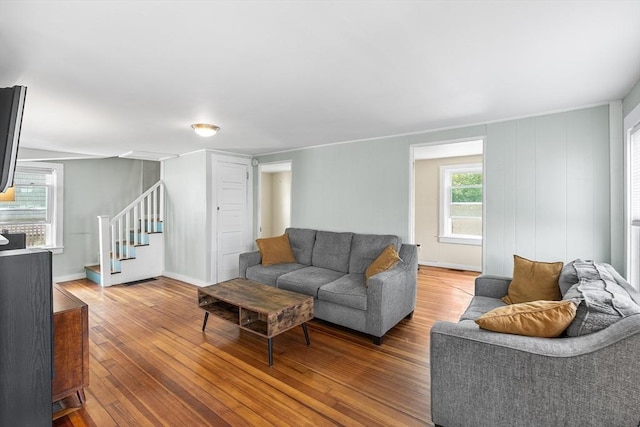 134 Hampton Cir, Hull, MA 02045 - living room with wood-type flooring, stairway, and baseboards