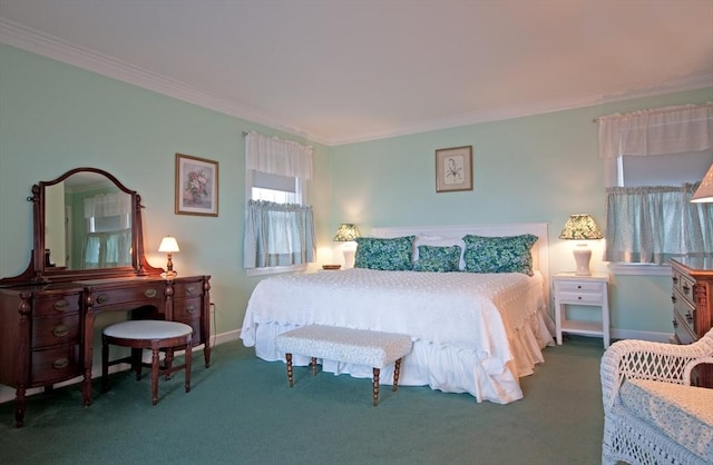 carpeted bedroom with baseboards and crown molding