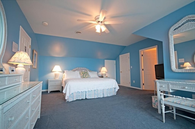 bedroom with ceiling fan, visible vents, baseboards, vaulted ceiling, and dark colored carpet