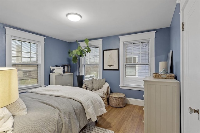 bedroom featuring wood-type flooring