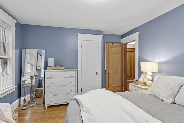 bedroom featuring light wood-type flooring