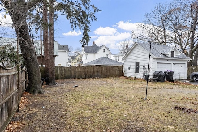 view of yard featuring a garage