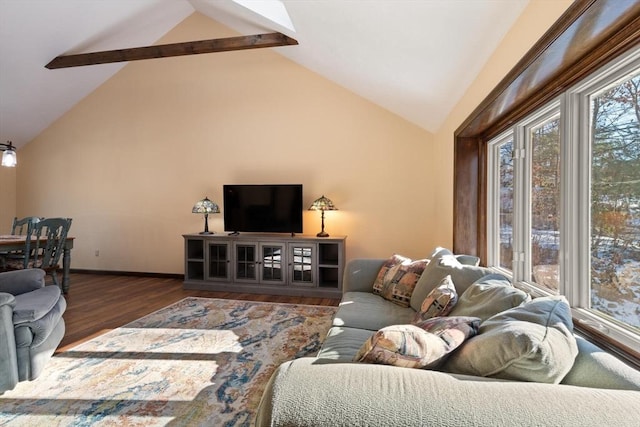 living room with dark hardwood / wood-style flooring and lofted ceiling with beams