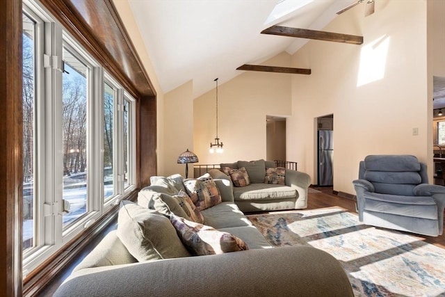 living room featuring dark wood-type flooring and lofted ceiling with beams