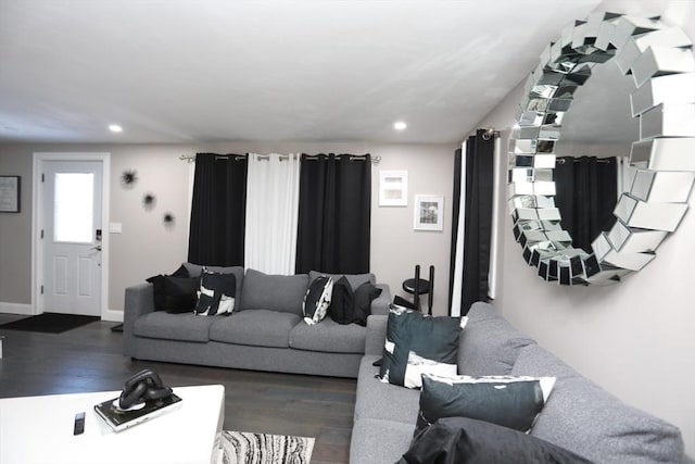 living room with recessed lighting, dark wood finished floors, and baseboards