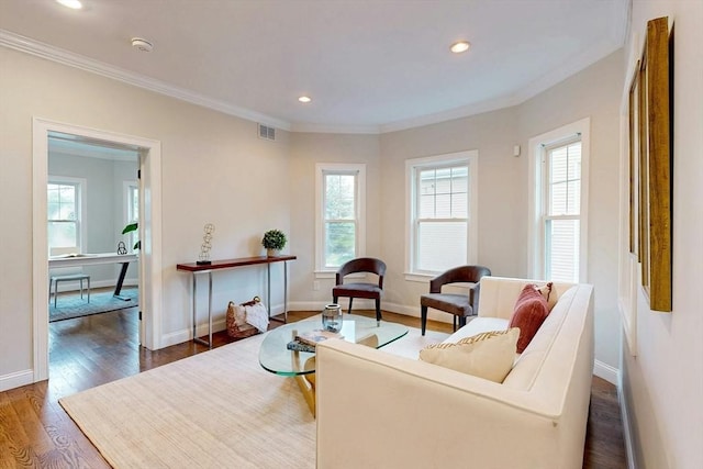 30 Pembroke St, Somerville, MA 02145 - living area with ornamental molding, wood finished floors, baseboards, and recessed lighting