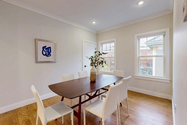 30 Pembroke St, Somerville, MA 02145 - dining room featuring ornamental molding, baseboards, light wood-type flooring, and recessed lighting