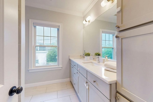30 Pembroke St, Somerville, MA 02145 - bathroom featuring double vanity, tile patterned flooring, ornamental molding, and baseboards