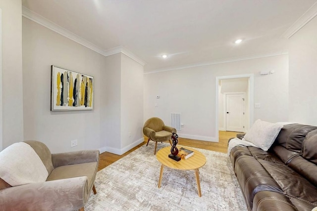30 Pembroke St, Somerville, MA 02145 - living room featuring light wood-type flooring, baseboards, ornamental molding, and recessed lighting