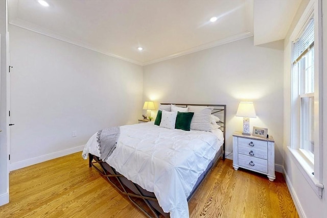 30 Pembroke St, Somerville, MA 02145 - bedroom with light wood-type flooring, crown molding, baseboards, and recessed lighting