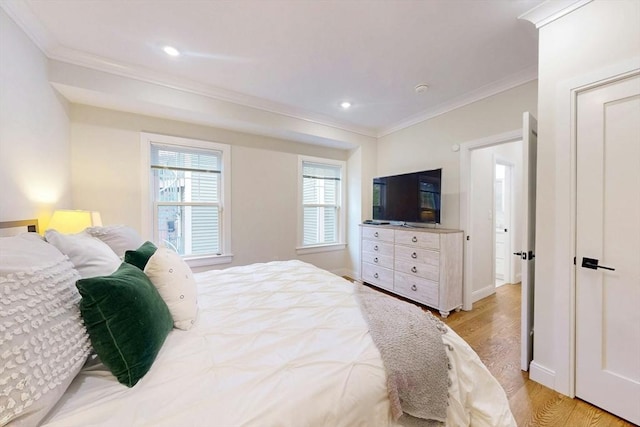 30 Pembroke St, Somerville, MA 02145 - bedroom featuring crown molding, light wood-style floors, recessed lighting, and baseboards