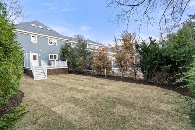 21 Francis St Unit 21, Newton, MA 02459 - view of grassy yard featuring a deck and stairs