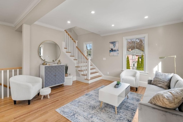 21 Francis St Unit 21, Newton, MA 02459 - living room featuring wood finished floors, ornamental molding, stairs, baseboards, and recessed lighting