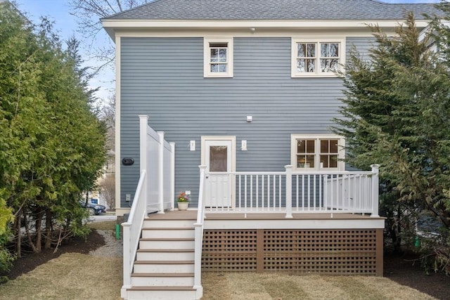 21 Francis St Unit 21, Newton, MA 02459 - rear view of property with roof with shingles, stairs, and a deck