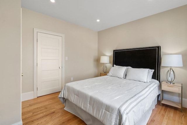 21 Francis St Unit 21, Newton, MA 02459 - bedroom with baseboards, light wood-style flooring, and recessed lighting