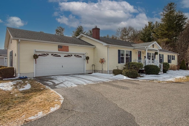 ranch-style home with a garage