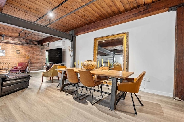 dining area featuring baseboards, brick wall, a wall mounted air conditioner, light wood finished floors, and wooden ceiling