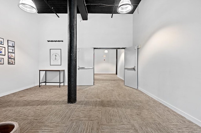 below grade area featuring baseboards