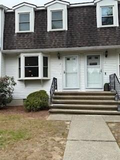 100 E 6th St Unit 2, Dracut, MA 01826 - view of front of home with roof with shingles