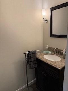 100 E 6th St Unit 2, Dracut, MA 01826 - bathroom featuring vanity and baseboards