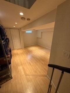 100 E 6th St Unit 2, Dracut, MA 01826 - below grade area with wood finished floors, baseboards, and recessed lighting