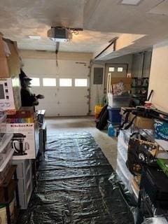 100 E 6th St Unit 2, Dracut, MA 01826 - garage featuring a garage door opener