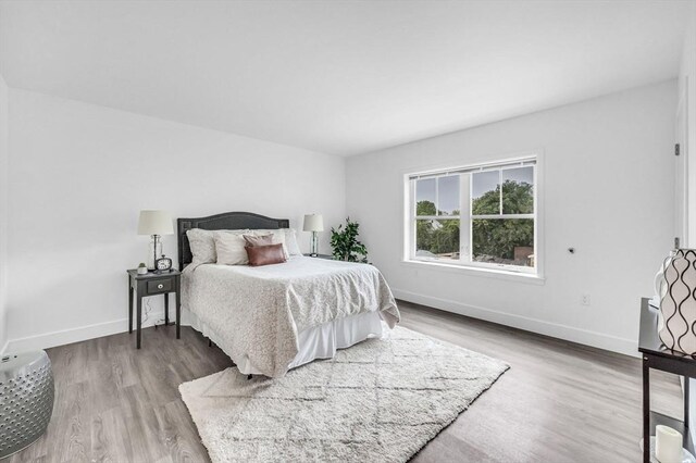 bedroom featuring hardwood / wood-style floors