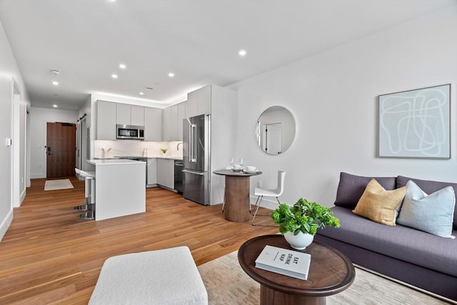 1515 Commonwealth Ave Unit 314, Boston, MA 02135 - living area with light wood finished floors and recessed lighting