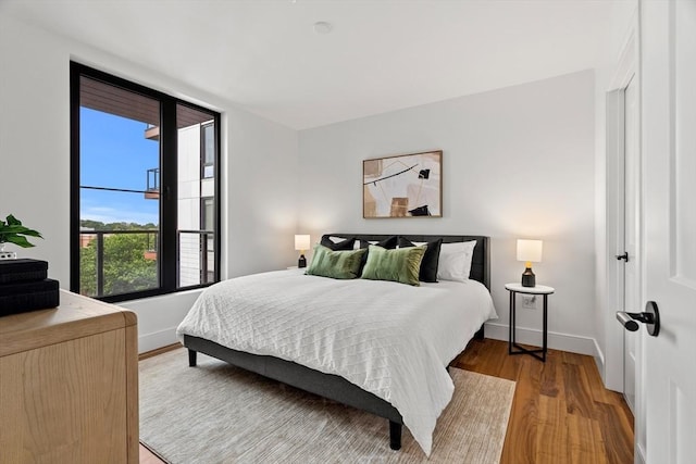 1515 Commonwealth Ave Unit 314, Boston, MA 02135 - bedroom with wood finished floors and baseboards