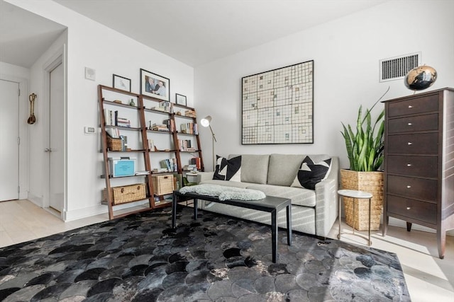 living area with light hardwood / wood-style floors