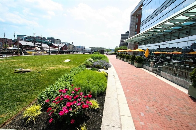 surrounding community featuring a lawn