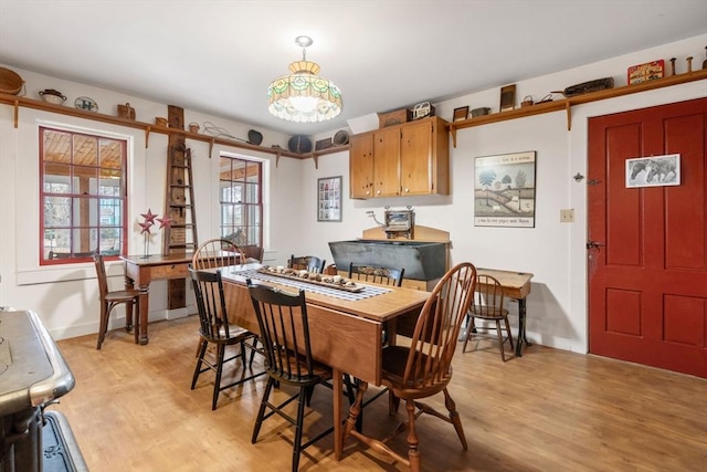 dining room with light wood-type flooring