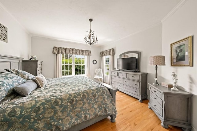 75 Country Way Unit 75, Dartmouth, MA 02748 - bedroom with crown molding, light wood-style flooring, and a chandelier