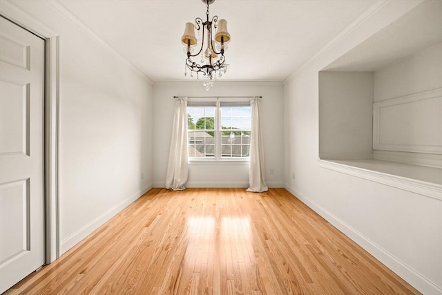 75 Country Way Unit 75, Dartmouth, MA 02748 - unfurnished dining area featuring a chandelier, wood finished floors, and crown molding