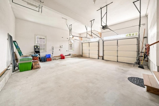 75 Country Way Unit 75, Dartmouth, MA 02748 - garage with a garage door opener