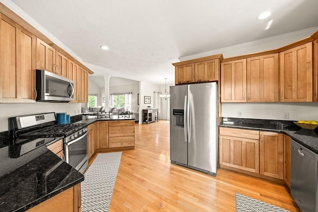 75 Country Way Unit 75, Dartmouth, MA 02748 - kitchen with appliances with stainless steel finishes, light wood finished floors, a peninsula, dark stone countertops, and recessed lighting