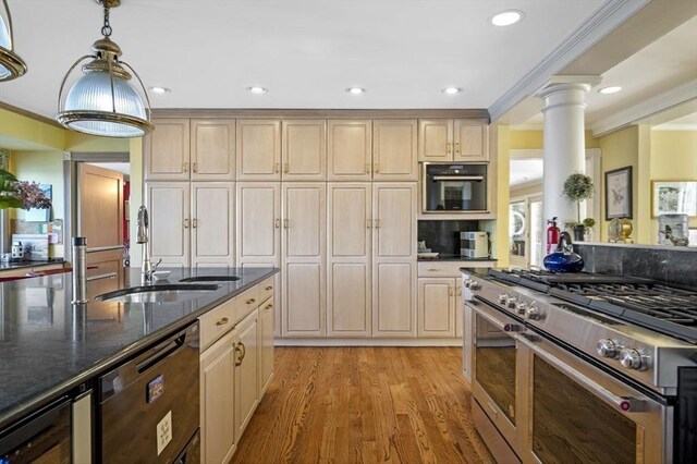 3 Anchorage Ln, Marblehead, MA 01945 - kitchen with range with two ovens, a sink, black dishwasher, crown molding, and recessed lighting