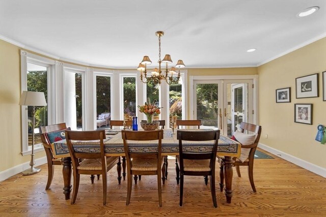 3 Anchorage Ln, Marblehead, MA 01945 - dining room featuring a chandelier, ornamental molding, baseboards, healthy amount of natural light, and light wood-type flooring