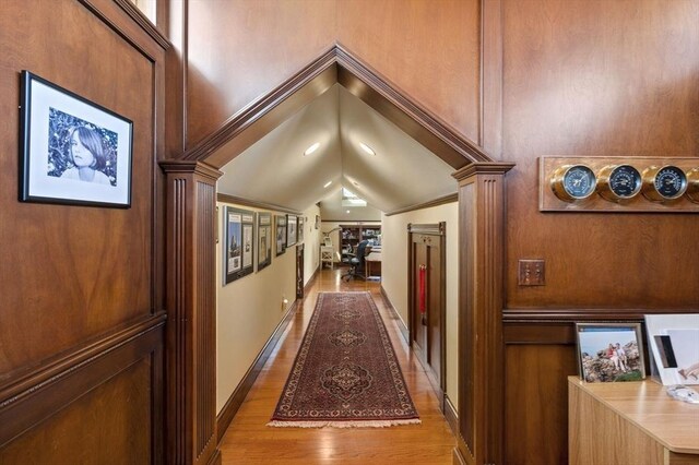 3 Anchorage Ln, Marblehead, MA 01945 - hall with lofted ceiling, wood finished floors, and baseboards