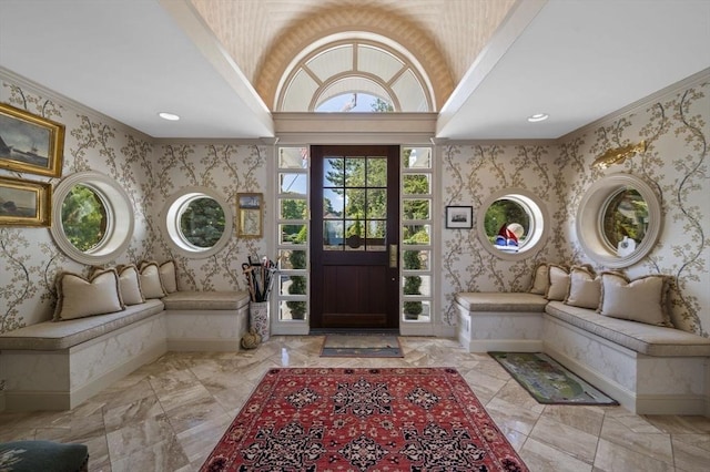 3 Anchorage Ln, Marblehead, MA 01945 - foyer entrance with wallpapered walls, baseboards, lofted ceiling, crown molding, and marble finish flooring