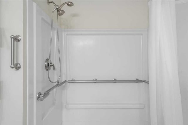 216 Reservoir St Unit 304, Holden, MA 01520 - bathroom featuring a shower with shower curtain