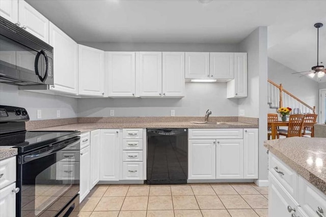216 Reservoir St Unit 304, Holden, MA 01520 - kitchen with black appliances, ceiling fan, a sink, and white cabinets