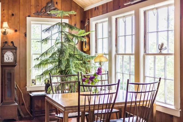 50 Higgins Ln, Wellfleet, MA 02667 - dining room with wood walls, plenty of natural light, and lofted ceiling