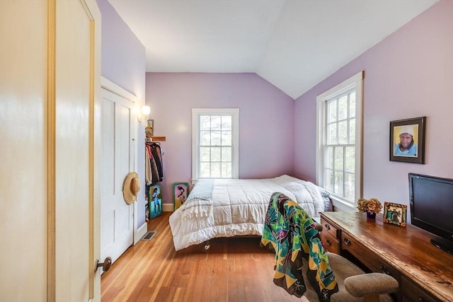 50 Higgins Ln, Wellfleet, MA 02667 - bedroom featuring vaulted ceiling and wood finished floors