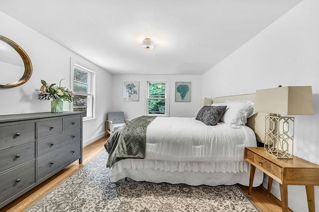 209 Brookside Rd, Needham, MA 02492 - bedroom with light wood-type flooring and baseboards