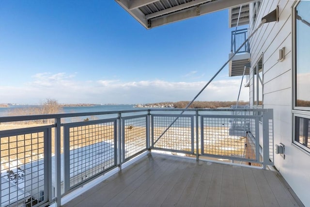 balcony featuring a water view